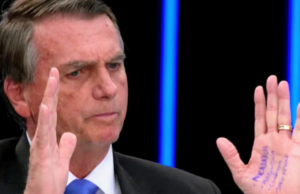 Bolsonaro provoca “Globo” com nome de doleiro em cola na mão